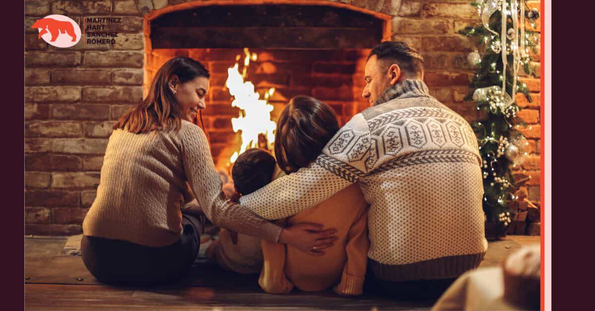 Family in front of a fire